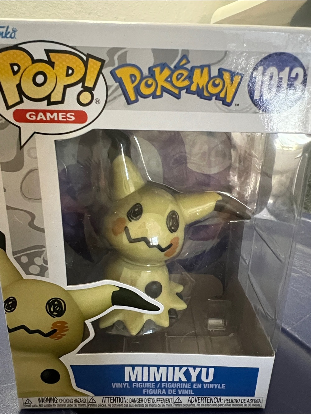 Funko Mimikyu Vinyl Figure in Pale Yellow and Black with Orange Cheeks